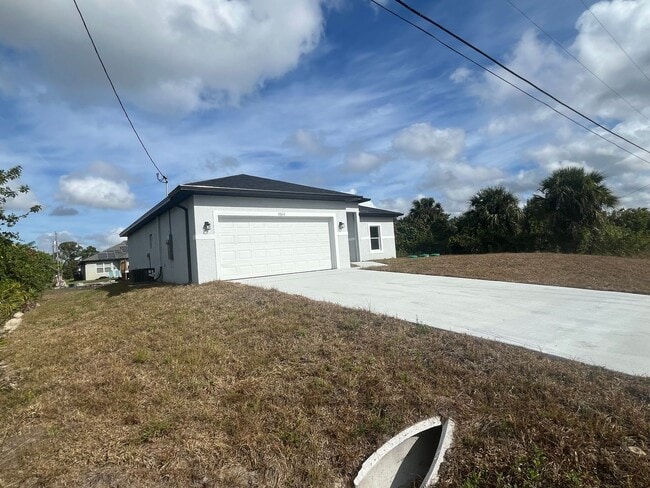 Photo - Brand new 4 bedroom 2 bath-2 car garage-SW LEHIGH ACRES