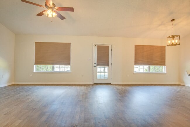 Navarre 4BR, 2BA Home with Open Floor Plan, Split Bedrooms, Wood-Look Flooring, 2-Car Garage & Fe...