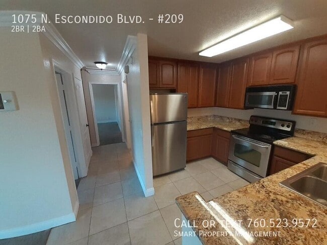 Building Photo - 1075 N Escondido Blvd Unit #209