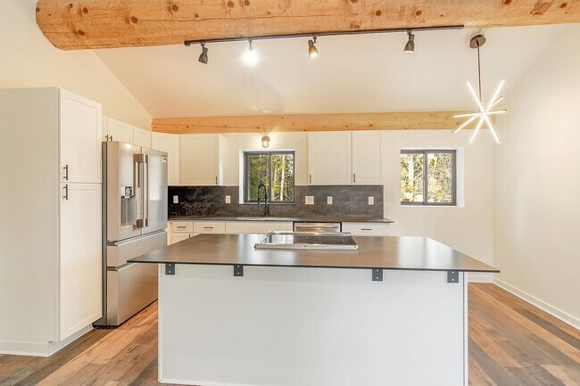 Photo - New Construction! Great Views! Deck! 20 minutes from Breck! In-floor radiant heat!