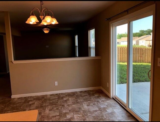 Photo - Spacious 4-Bedroom Home with Loft, Fenced Backyard & Modern Finishes