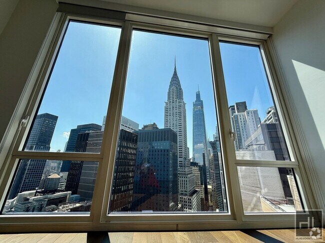 Building Photo - SUNNY NO FEE STUDIO IN THE LUXURY SUMMIT NYC Unit 40D Rental