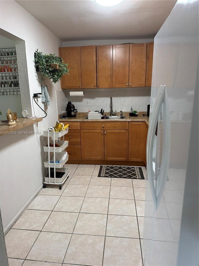Building Photo - 9445 SW 76th St Unit U6