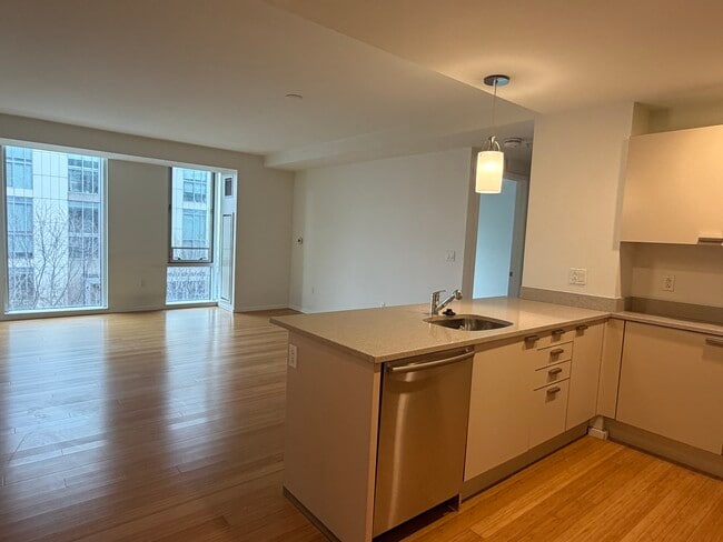 Open plan kitchen/dining/living - 2 Earhart St Unit 402