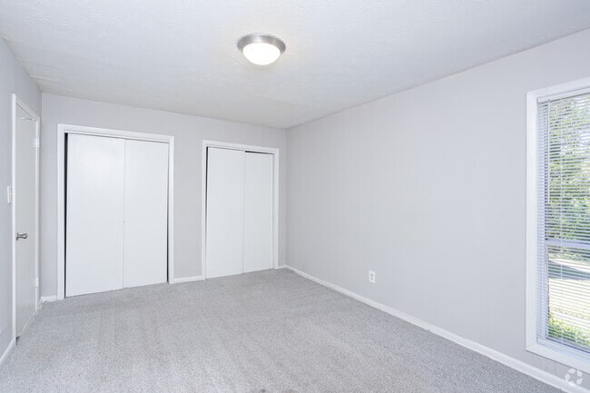2BR, 1.5BA - 1,032SF - Primary Bedroom