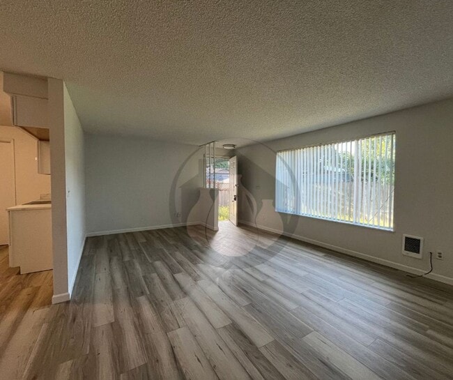 Photo - Single Level Triplex Ready to move In!