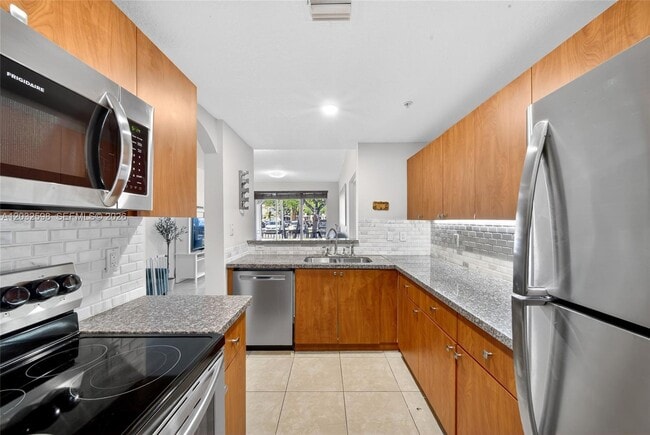 Building Photo - 6670 NW 114th Ave Unit 602