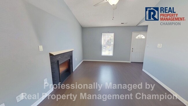 Photo - Charming 2BD/2 BA End Unit Townhouse w/Fireplace and Fenced Backyard