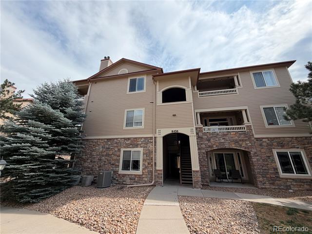 Building Photo - 8456 S Hoyt Way Unit 308