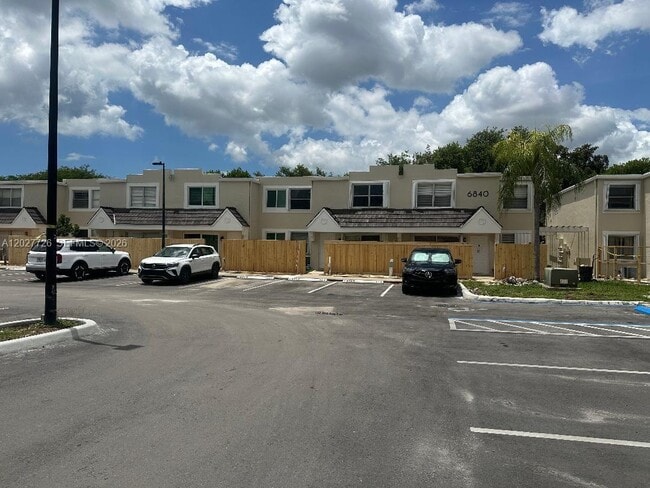 Building Photo - 6840 SW 45th Ln Unit 6
