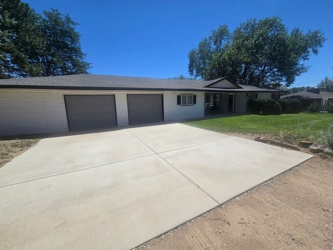 Photo - Rural 3 Bedroom Home in Fort Collins with Attached Garage and HUGE Yard Now Available! NO HOA!