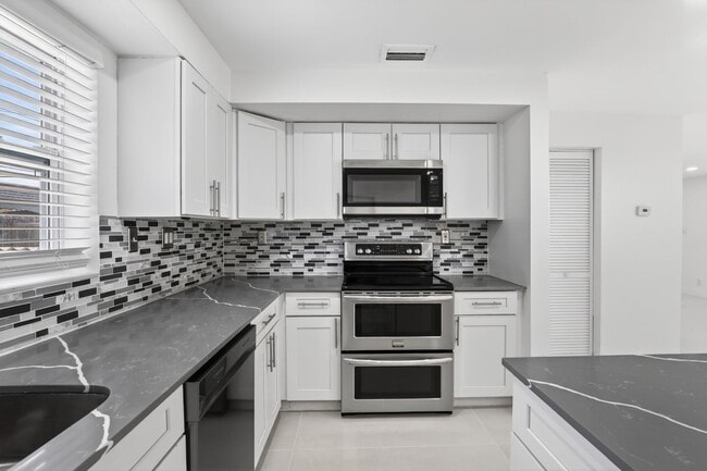 Photo - Renovated 3BR/2BA Corner Single-Family Home – Large Fenced Yard, NO HOA Unit 3/2