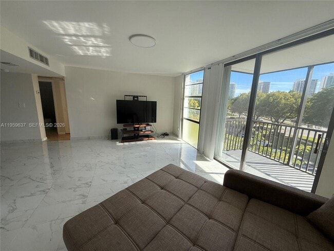 Building Photo - 3475 N Country Club Dr Unit 408