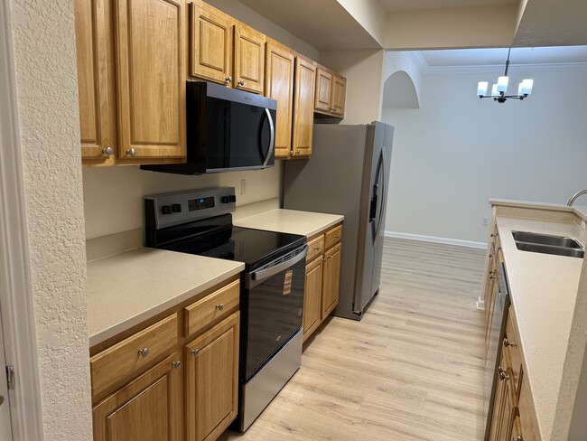 Photo - 10075 Gate Pky N Unit 209