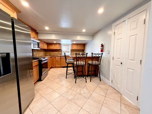 Photo - Move in ready, spacious, 4 bedroom, 3 bath single-family home available for rent in Hackensack, NJ.