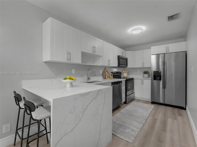 Building Photo - 10379 NW 35th St Unit 10379