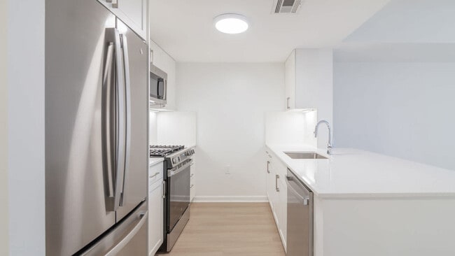 Kitchen with Stainless Steel Appliances - The Reserve at Clarendon Centre