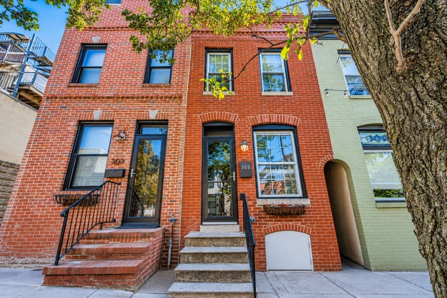 Building Photo - Charming Baltimore Rowhome with Exposed Brick & Private Patio