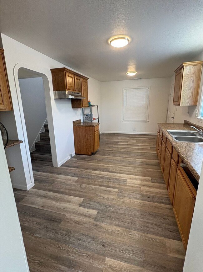Photo - Spacious 3 Bedroom + Office | Updated Flooring | Bright & Inviting