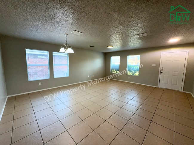 Photo - Spacious 4-Bedroom Home with Fireplace & Large Backyard in SW Fort Worth