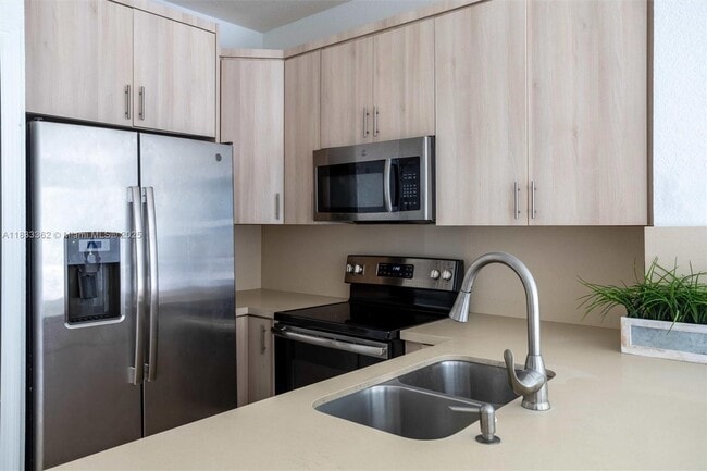 Building Photo - 17640 NW 73rd Ave Unit 201-19 Rental