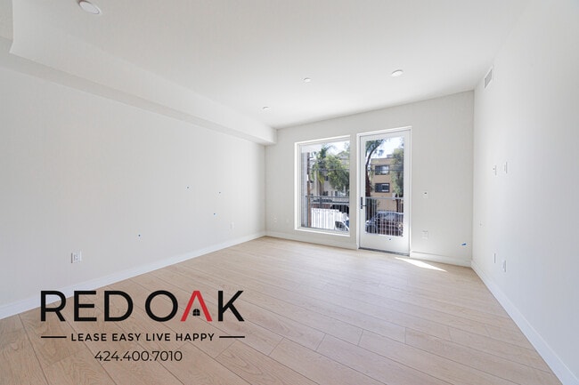 Building Photo - 5320 Cartwright Ave Unit 212