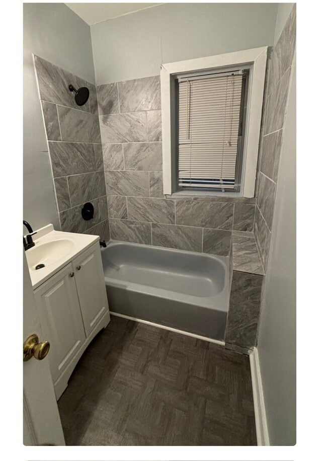 Newly renovated bathroom - 8046 S Maryland Ave Apartments Unit 1