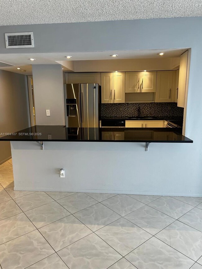 Photo - 501 Three Islands Boulevard Unit 108