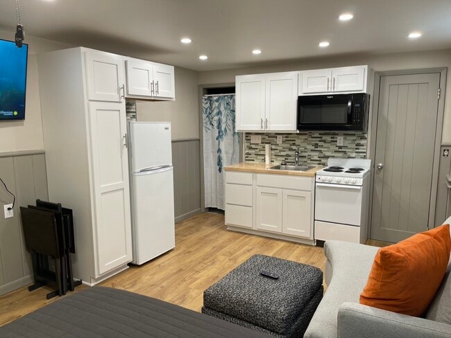 Building Photo - 7600 Main St Unit 304