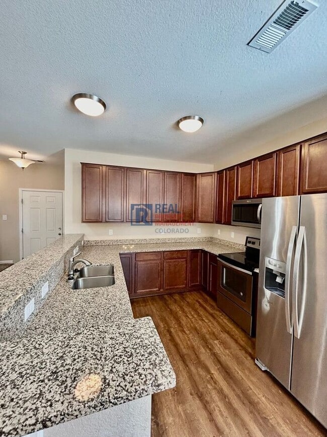 Photo - 14700 E 104th Ave