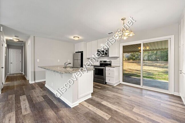 Photo - Renovated 4 bdrm/ 2 bath - Open Floor Plan...