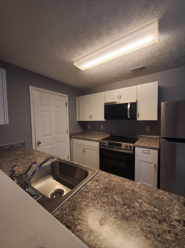 Photo - Open House on Spacious Condo