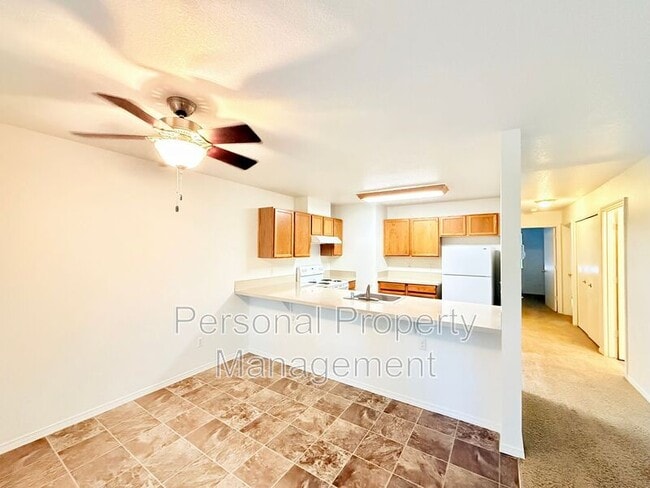 Building Photo - 3412 NE 66th Ave Unit B25