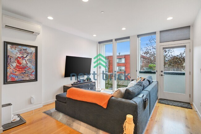 Photo - Charming 2-Bedroom Townhouse with 2.5 Baths and Spacious 1,510 Sq Ft in Seattle's Vibrant Neighbo...