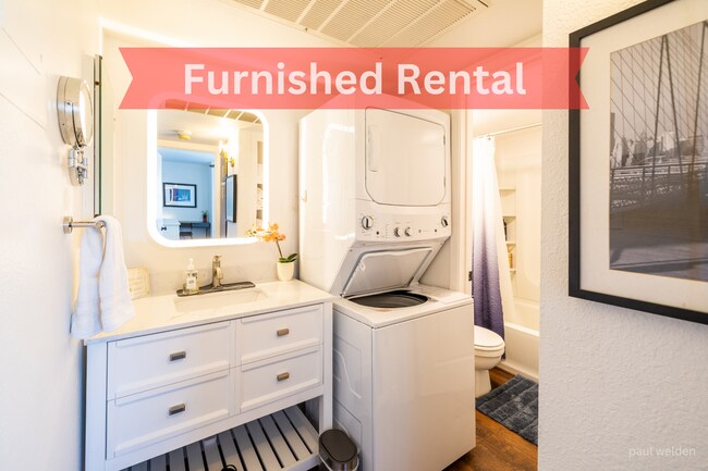 bathroom vanity backlit mirror and washer/dryer - 1111 E University Dr Unit 205