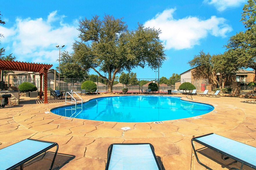 Pool with lounge chairs