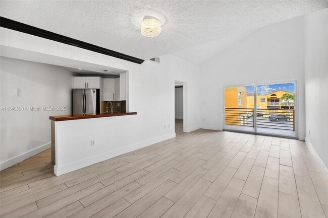 Building Photo - 9741 Fontainebleau Blvd Unit H201 Rental