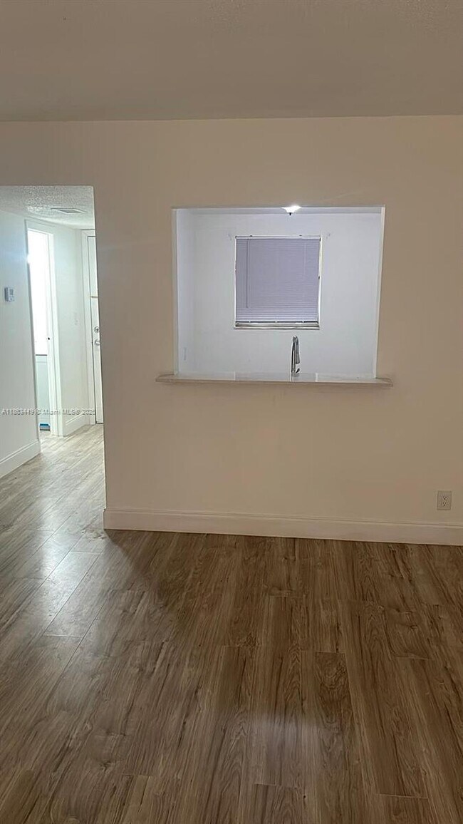 Building Photo - 18101 NW 68th Ave Unit E103 Rental