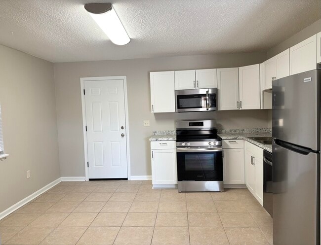 Building Photo - 316 Lewis St Unit D