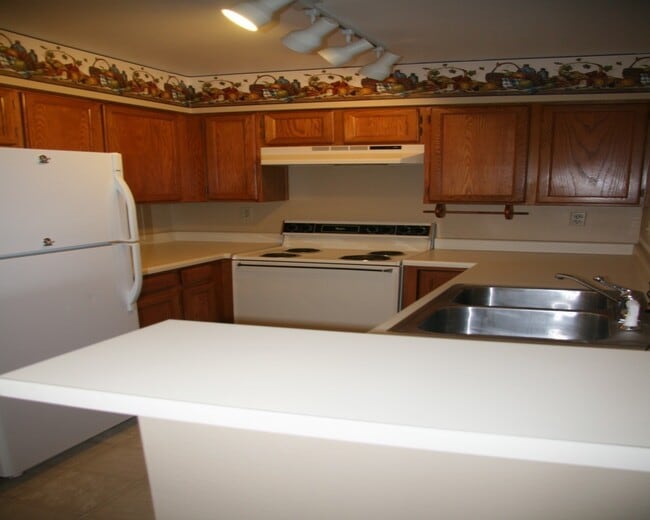 Photo - Charming 2 Bedroom Second Story Condo with easy access to everything!