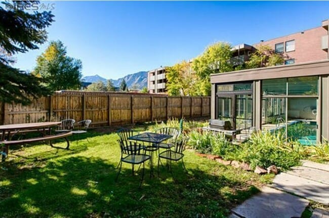 Grill/picnic area next to indoor pool with great Flatirons view