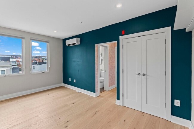 Photo - Bright Top-Floor 1BR Condo in Columbia Hei...