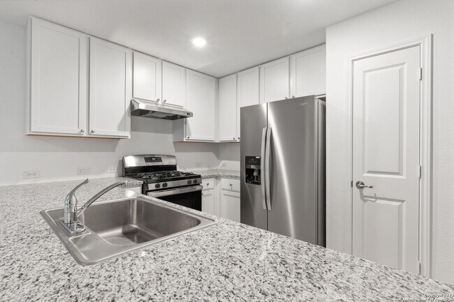 Photo - This beautiful single-story home has 4 bedrooms, 2 baths, vinyl flooring throughout, an open floo...