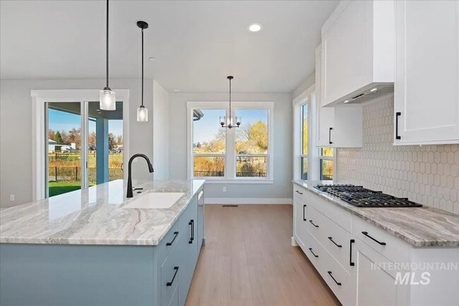 Photo - Brand New Spacious 4-Bedroom Home with 3-Car Garage, Granite Kitchen & Prime Middleton Location