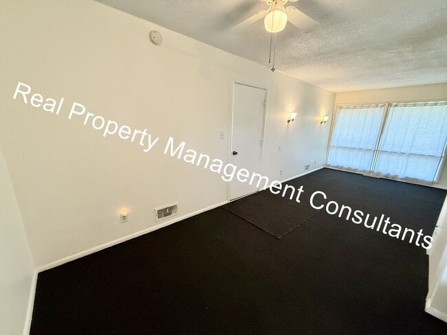 Photo - Charming 3-Bed Home with Fenced Yard & Garage