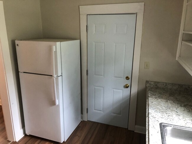 Photo - Freshly Painted 2x1 with Brand-New Plank F...