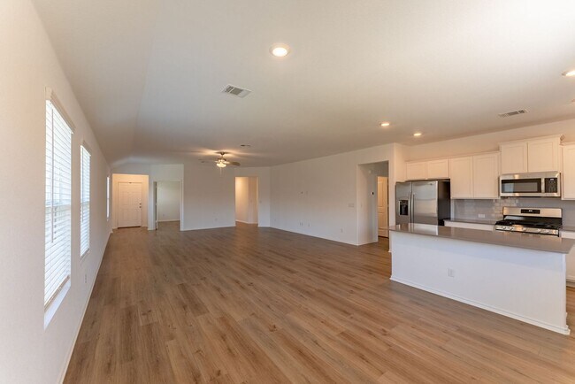 Photo - Modern Elegance in Kyle: 3BR Home with Office, Double Vanity, and Stylish Kitchen Island