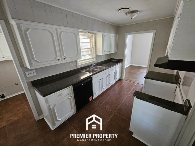 Photo - Spacious 4BR/2BA Home Near Hickory Hill | 1,805 Sq Ft, Hardwood Floors & Formal Dining Area