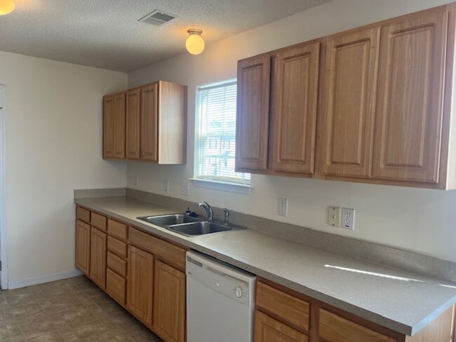 Photo - Spacious 3-Bedroom Home with Loft & Large Backyard!