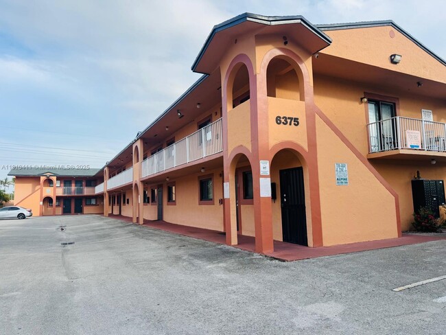 Building Photo - 6375 W 22nd Ct Unit 204